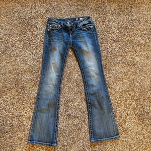 Miss Me Mid Rise Signature Boot Jean